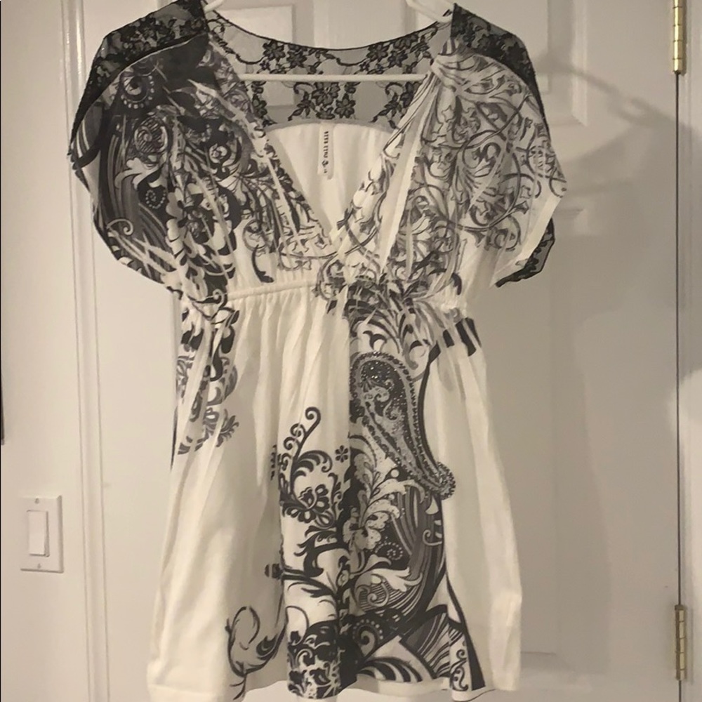 Fit and flare, very flattering.